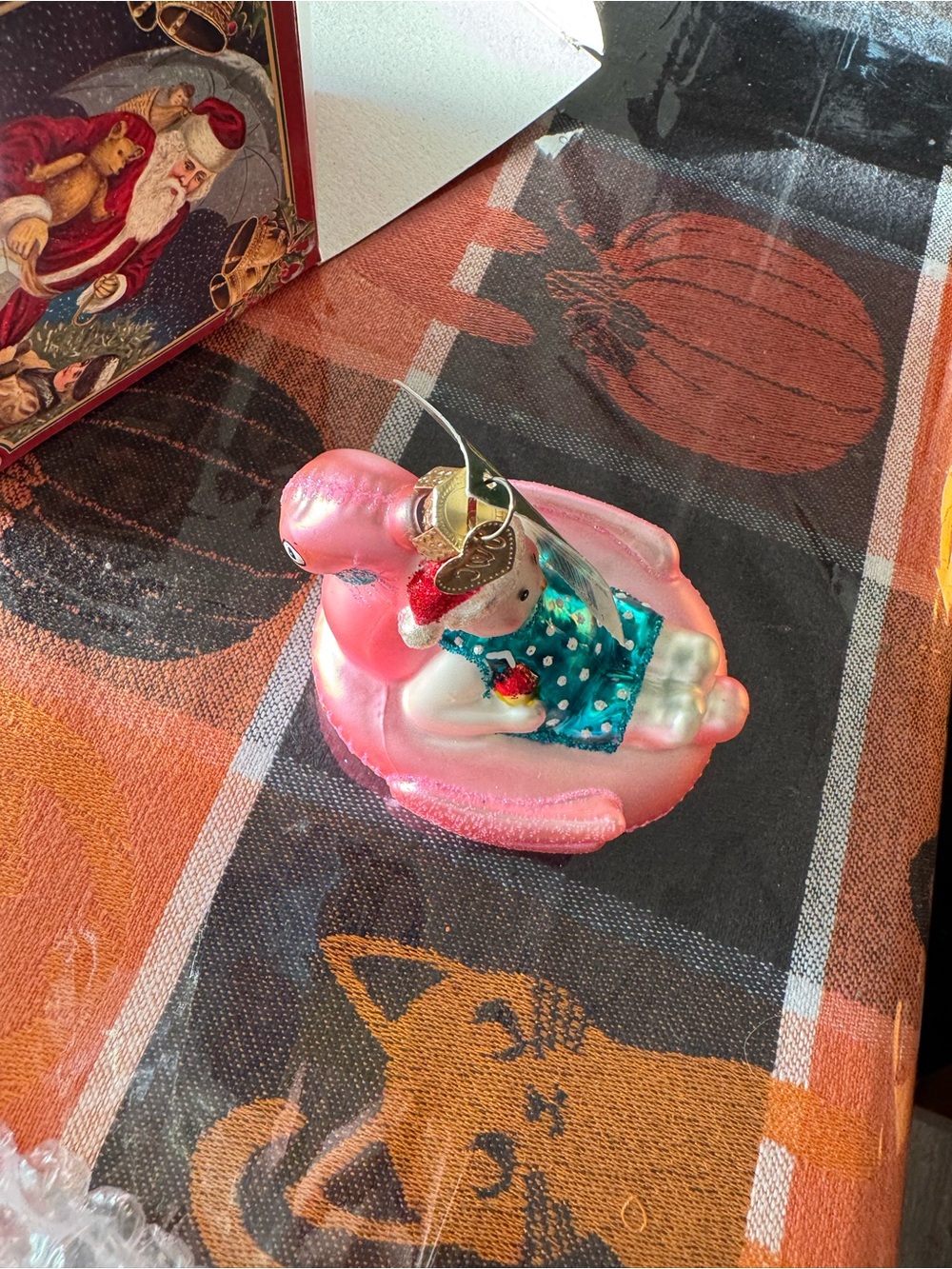 Pink flamingo float ornament with snowman- cute blown glass